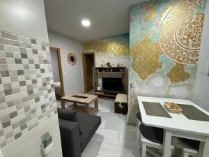 Posedenie v ubytovaní Apartamento céntrico en Plaza San Miguel