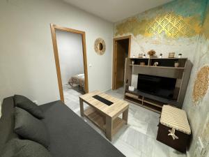 Posedenie v ubytovaní Apartamento céntrico en Plaza San Miguel