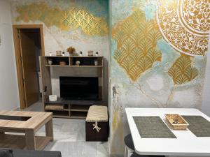 Posedenie v ubytovaní Apartamento céntrico en Plaza San Miguel