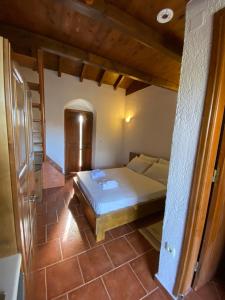 A bed or beds in a room at To Palio