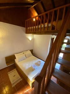 A bed or beds in a room at To Palio