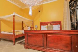 Postel nebo postele na pokoji v ubytování Fort Suites