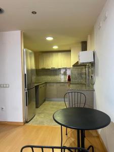 A kitchen or kitchenette at Barcelona Sagrada Familia Apartment