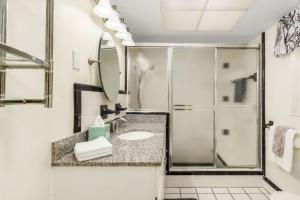 a bathroom with a shower and a sink at Villa Catalina Isles - Holidays in Paradise in Cape Coral +31 photos
