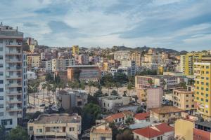a cityscape of a city with tall buildings at Sky Apartments in Durrës