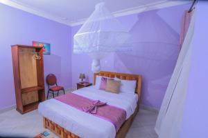 Postel nebo postele na pokoji v ubytování Fort Suites