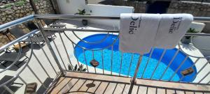 a spiral staircase with a towel hanging on a railing at Apartment Delic in Crikvenica