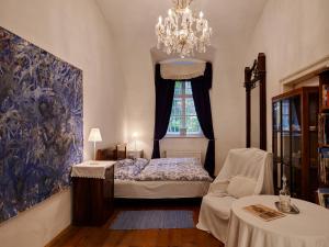 Postel nebo postele na pokoji v ubytování Schloss Hollenburg Aparte Apartments