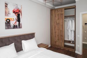 Ein Bett oder Betten in einem Zimmer der Unterkunft Deluxe Park Z hotel
