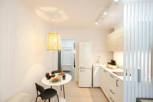 Η κουζίνα ή μικρή κουζίνα στο Puławska 11 -Prywatny apartament 4 osobowy w centrum Warszawy - Better Rental