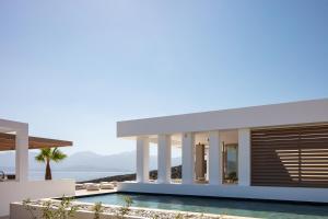 a rendering of a villa with a swimming pool at Pure C in Vathi