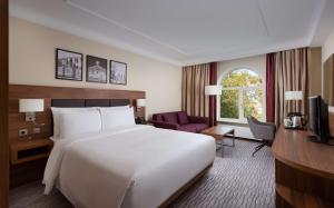 Łóżko lub łóżka w pokoju w obiekcie Radisson Hotel Ulyanovsk