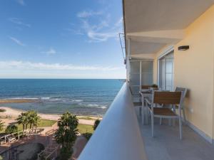 a balcony with a view of the ocean at MIRAMAR ~ El Campello in El Campello