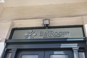 a sign over the door of a building at BeiRoom Hyde Park Apartments in London