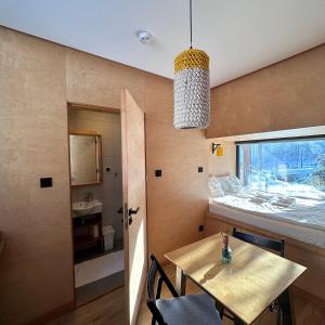 Kuchyň nebo kuchyňský kout v ubytování Apartamenty Szuflandia z sauną, jacuzzi, przy stoku narciarskim