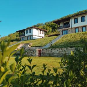 a building with grass on the side of a hill at Eco Lodge St Ignatius Еко лодж Игнажден in Debelets