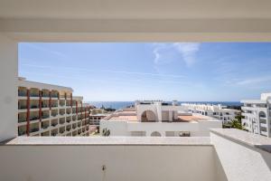 a view from the balcony of a building at Casa Azul 3 - Senhora da Rocha, Algarve in Porches