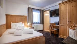 Postel nebo postele na pokoji v ubytování Hotel Schmung
