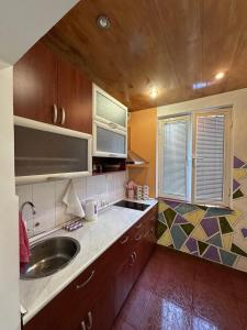 Kuchyň nebo kuchyňský kout v ubytování Guest House Central