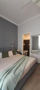 Łóżko lub łóżka w pokoju w obiekcie Hotel Castelfidardo