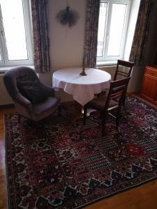 Posezení v ubytování Garconniere im ehemaligen Hotel Austria