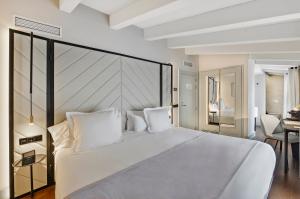 Posteľ alebo postele v izbe v ubytovaní Summum Boutique Hotel, member of Meliá Collection