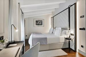 Posteľ alebo postele v izbe v ubytovaní Summum Boutique Hotel, member of Meliá Collection