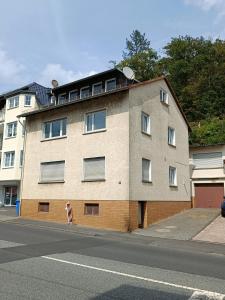 a building on the side of a street at Geräumige helle Wohnung im grünen Taunus mit Privatparkplatz in Schlangenbad