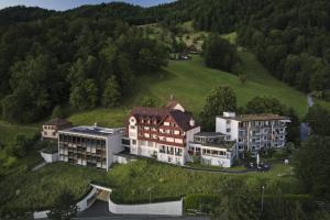 an aerial view of a building on a hill at Zentrum Elisabeth in Walchwil