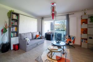 Posezení v ubytování Lumineux avec terrasse au calme en hyper centre.