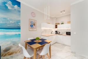 Kuchyň nebo kuchyňský kout v ubytování Apartament Greywave przy plaży - Darmowy Parking