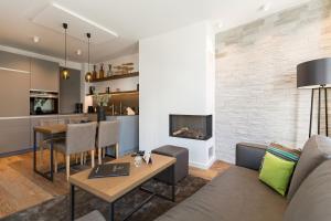 TV a/nebo společenská místnost v ubytování Beachhouse Bansin App 15