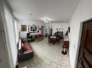 a living room with a couch and a table at Teté in Lima