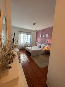 Postel nebo postele na pokoji v ubytování Habitación Dache Lanzarote