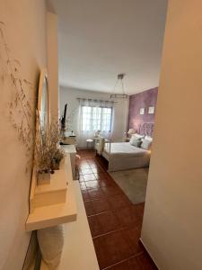 Postel nebo postele na pokoji v ubytování Habitación Dache Lanzarote