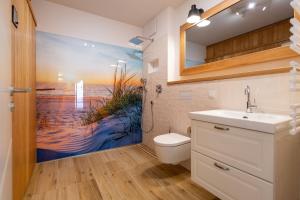Ein Badezimmer in der Unterkunft Domizil Meerzeit, App. 7