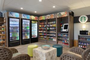 a soda shop with chairs and a table and drinks at Surfside Beach Oceanfront Hotel in Myrtle Beach