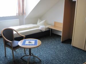 Postel nebo postele na pokoji v ubytování Hotel Jagermo