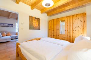 Ein Bett oder Betten in einem Zimmer der Unterkunft Ferienhaus Silva
