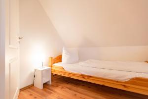 Ein Bett oder Betten in einem Zimmer der Unterkunft Ferienhaus Silva