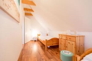 Ein Bett oder Betten in einem Zimmer der Unterkunft Ferienhaus Silva