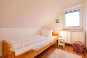 Ein Bett oder Betten in einem Zimmer der Unterkunft Ferienhaus Silva