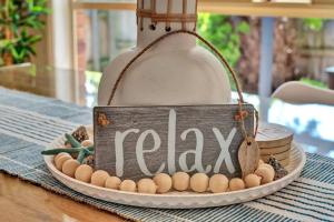 a sign that says pray on a plate of eggs at Tranquil Escape by Ready Set Stay in Dromana