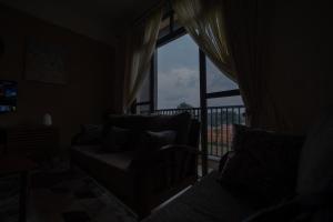 Posezení v ubytování Lake Home Entebbe 2