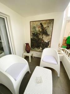 Postel nebo postele na pokoji v ubytování Cabarete Kite Beach Rooms & Condos