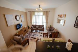 TV a/nebo společenská místnost v ubytování Lake Home Entebbe 2