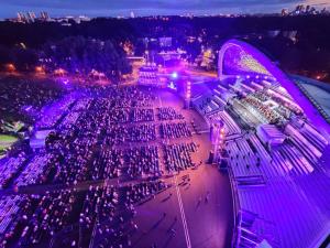 an aerial view of a parking lot at night at Song Festival apartment, 5-10 min from bus/airport in Tallinn