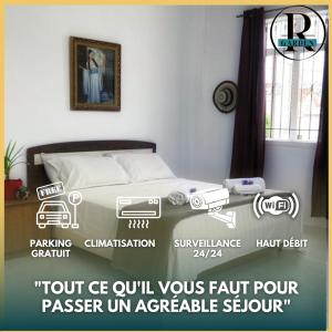 a poster of a bedroom with a bed in a room at R Garden Villa au calme de Baie du tombeau, Appartement familiale de 2 chambres et cuisine in Baie du Tombeau