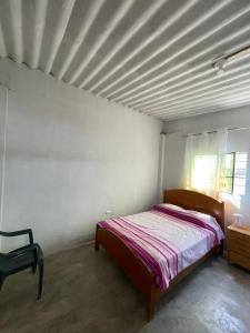 Casa de mamá María tesisinde bir odada yatak veya yataklar