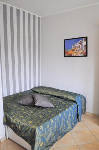 Postel nebo postele na pokoji v ubytování Giuly's home - Inalpi Arena-PalaAlpitour-Università-Ling8 Fiere-Stadio